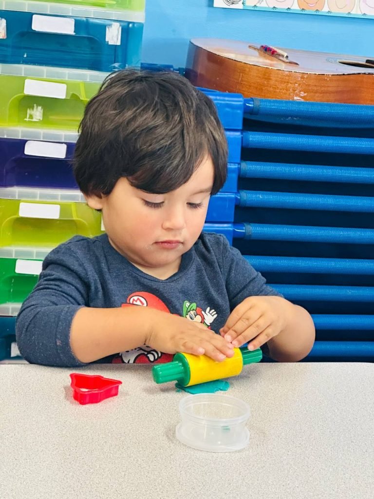 The boy is playing